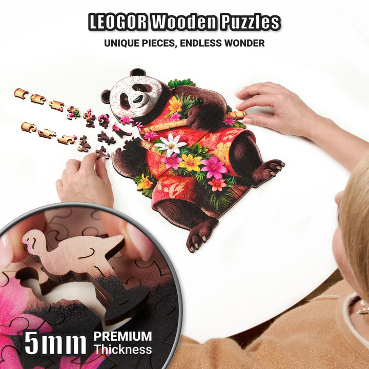 Hands placing thick wooden pieces in panda puzzle, showing detail and bright wood tones