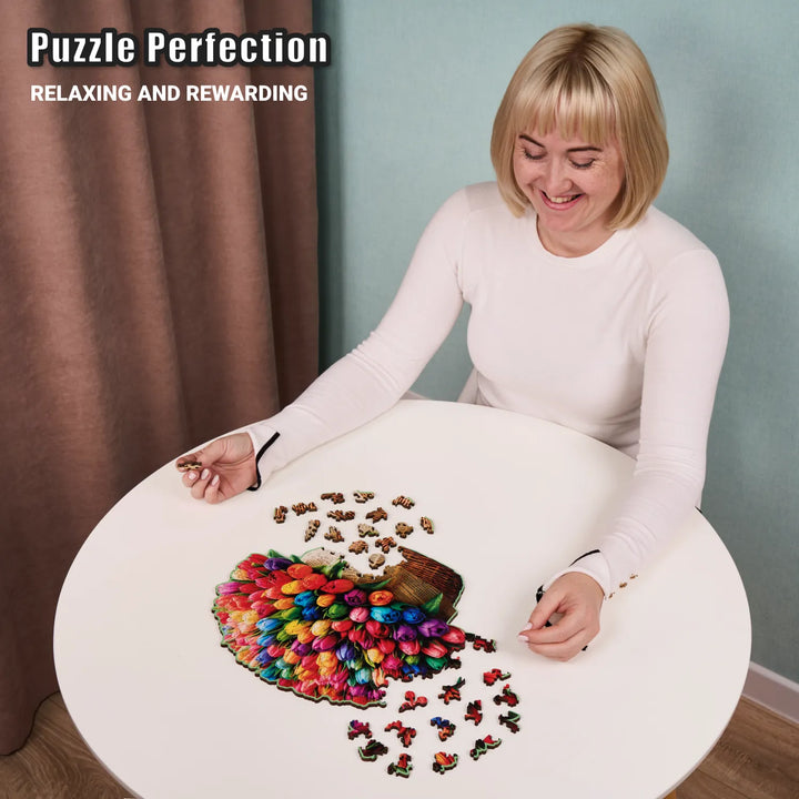 Woman assembling compact 200-piece Flower puzzle on table with cheerful tulip shapes and colors
