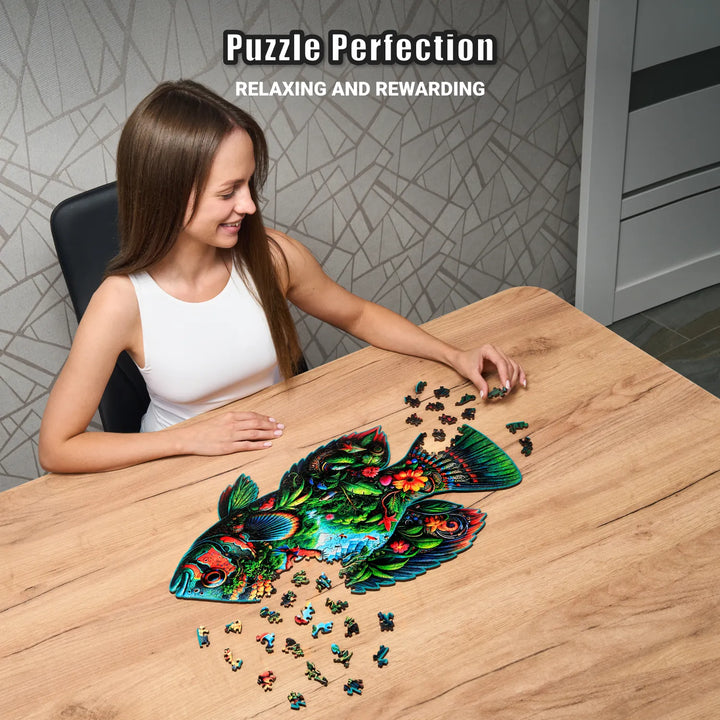 350-piece fish-shaped puzzle in progress with jungle colors and nature-inspired shaped wood pieces