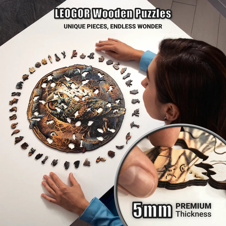 Close-up of thick 5mm wooden puzzle piece from 350 piece owl jigsaw puzzle being placed in position