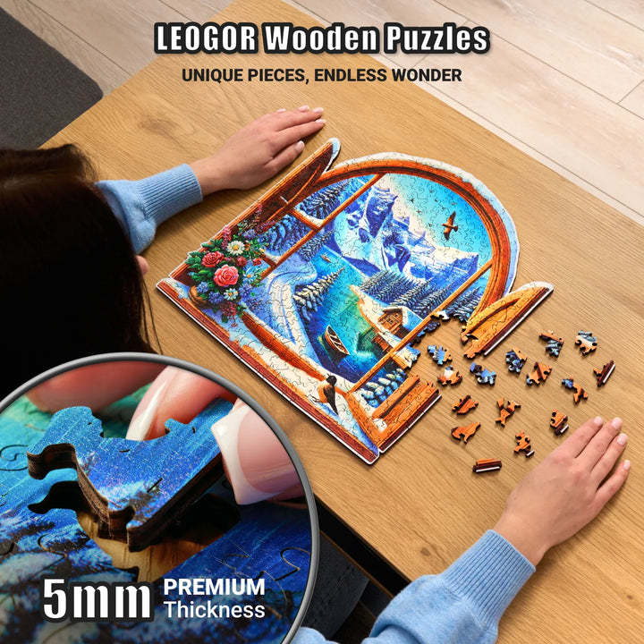 Close-up of thick wood piece in winter puzzle, showing snow-covered detail and vivid printing