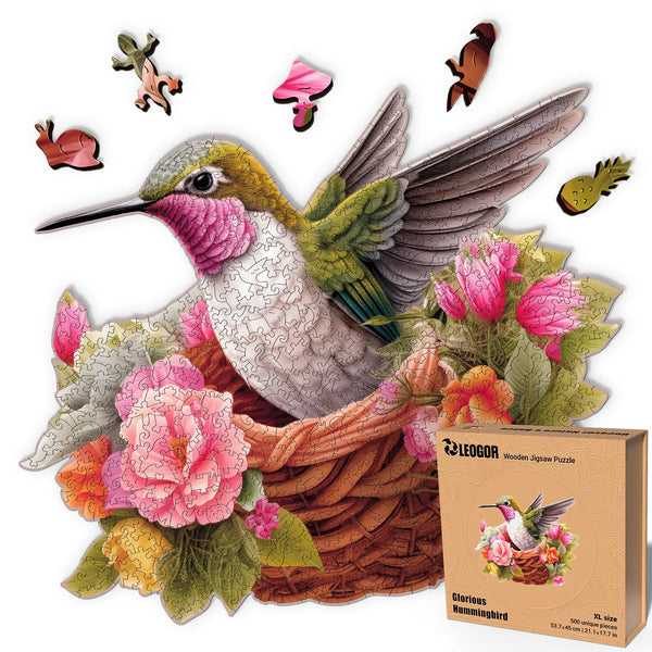 Glorious Hummingbird 500-piece XL puzzle shaped like a bird, with floral art and vibrant whimsy cuts