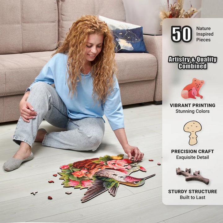 Woman working on Hummingbird puzzle with floral animal cuts and vibrant rainforest vibes, relaxed