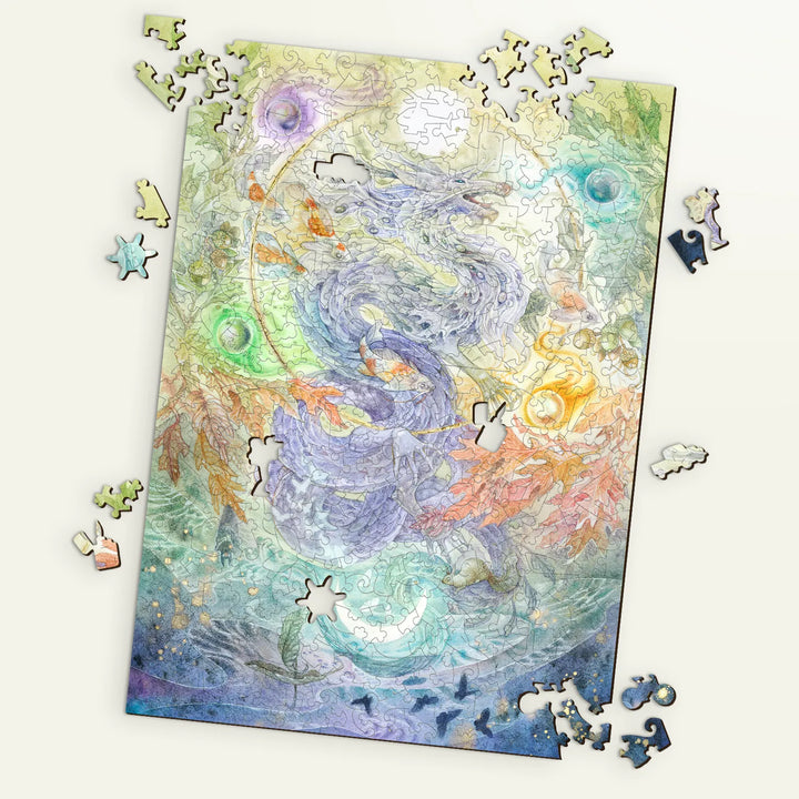 Fluid celestial dragons and leaves on wood puzzles for adults – Encircle by Stephanie Law