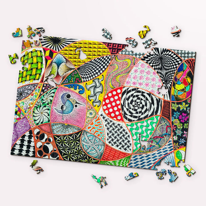 Bright geometric patterns on wood puzzles for adults – detailed artistry by John Nelson