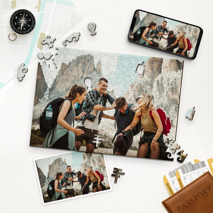 Friends with backpacks in front of mountains, shown as personalized puzzle with compass & passports